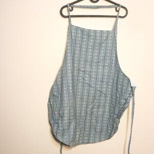 Reversible blue patterned apron, over the head strap and tie waist strings,